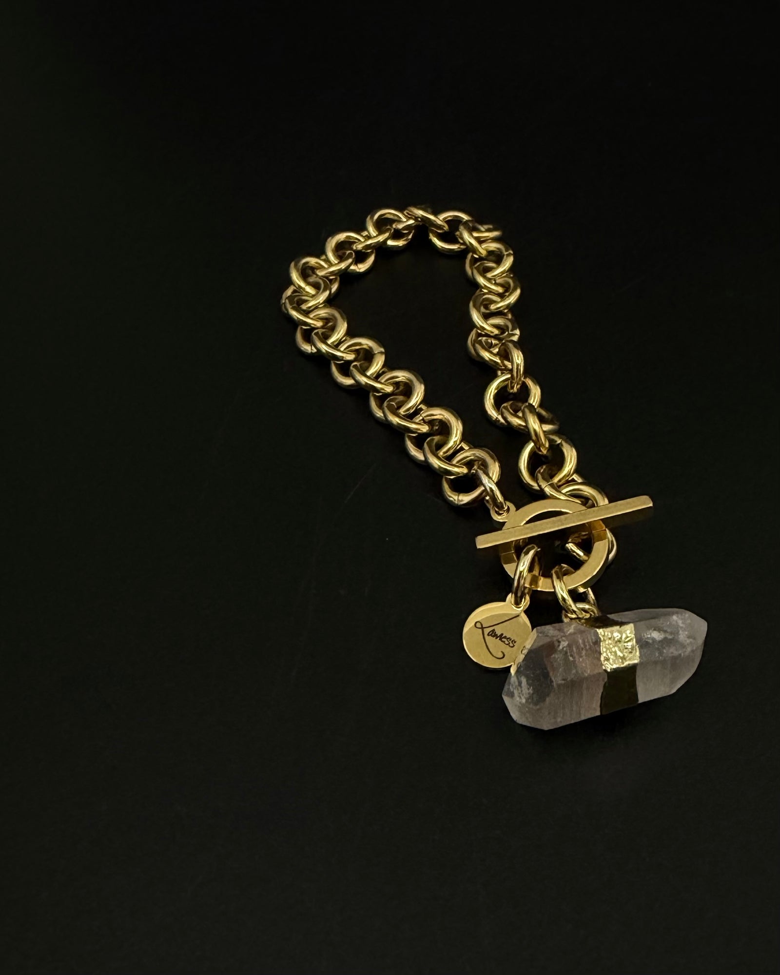 Gold-plated stainless steel chain bracelet with raw clear quartz crystal detail on an 8 mm chain and toggle clasp, Athena Axiom Bracelet by Lawless Jewellery.