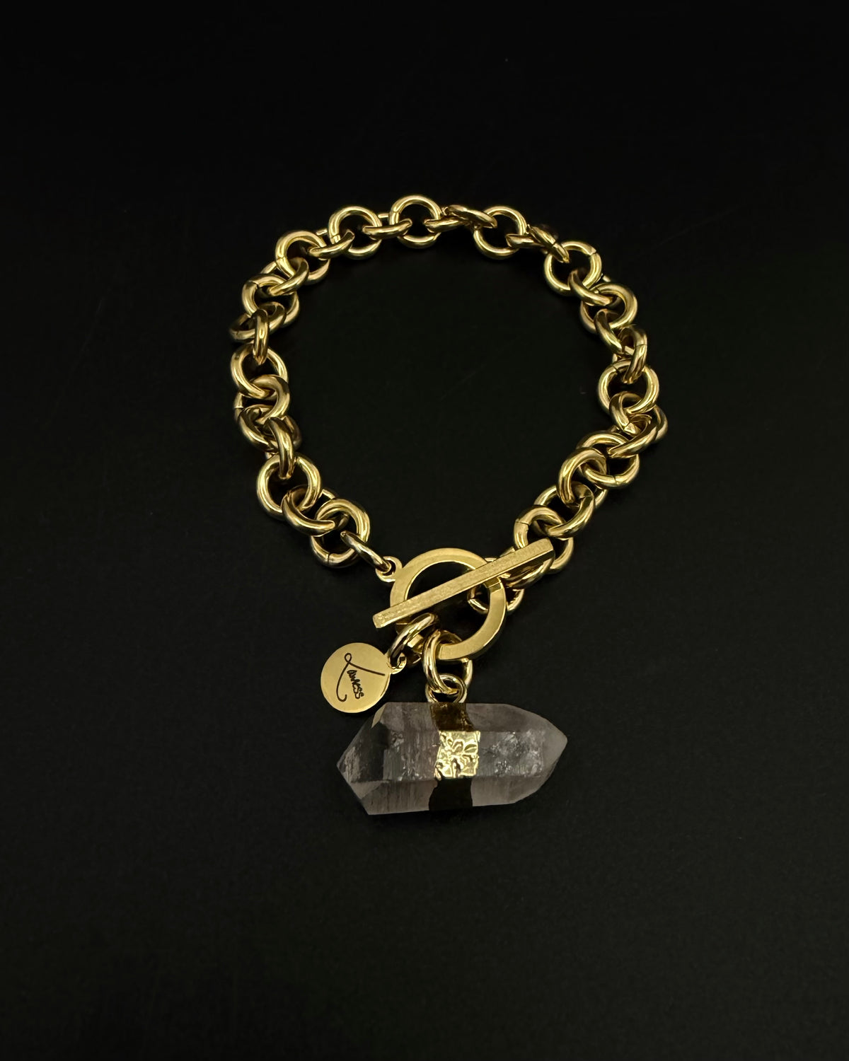 Gold-plated stainless steel chain bracelet with raw clear quartz crystal detail on an 8 mm chain and toggle clasp, Athena Axiom Bracelet by Lawless Jewellery.