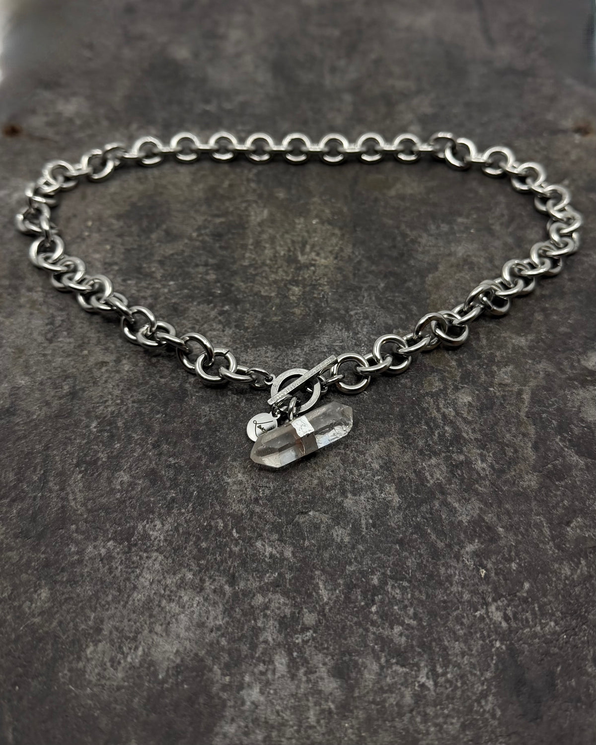 Stainless steel 12mm link chain necklace with raw quartz crystal pendant and toggle clasp, 47cm length — Athena Axiom Necklace, Lawless Jewellery.