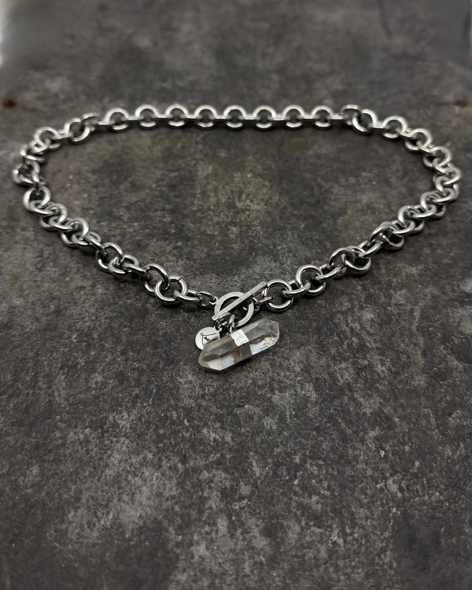 Stainless steel 12mm link chain necklace with raw quartz crystal pendant and toggle clasp, 47cm length — Athena Axiom Necklace, Lawless Jewellery.