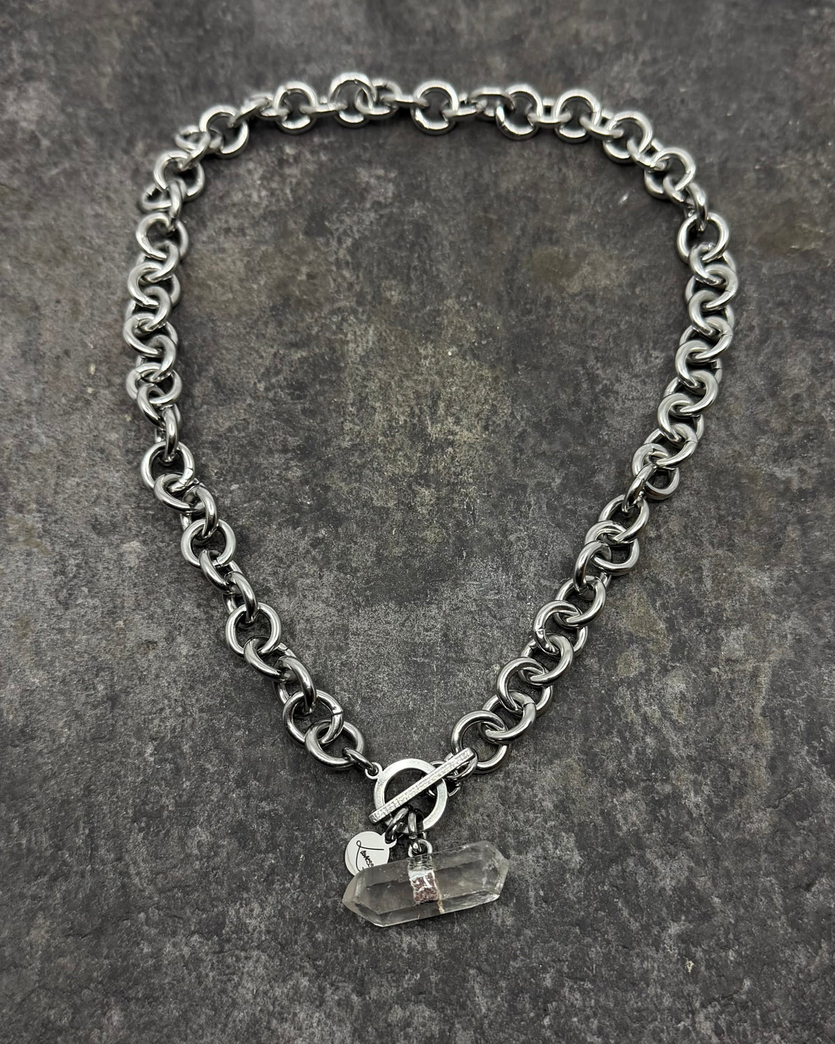 Stainless steel 12mm link chain necklace with raw quartz crystal pendant and toggle clasp, 47cm length — Athena Axiom Necklace, Lawless Jewellery.