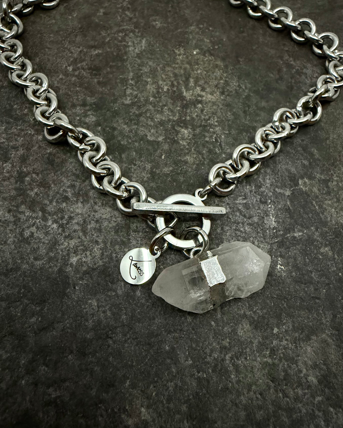 Stainless steel 8mm link chain necklace with raw quartz crystal pendant and toggle clasp, 47cm length — Athena Axiom Necklace, Lawless Jewellery.