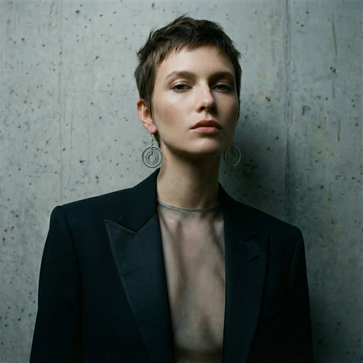 ilver stainless steel triple-ring earrings with three interlinked high-polish rings and stainless steel hooks, 5 cm length — Lawless Jewellery.