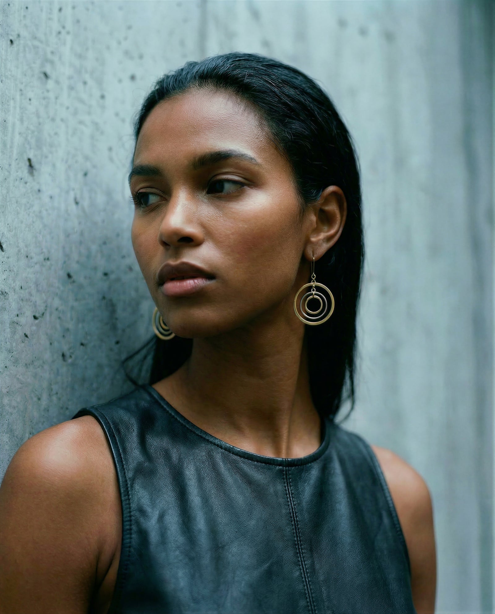 Mixed-metal stainless steel earrings with three interlinked concentric gold and silver rings and stainless steel ear hooks, 5 cm length — Lawless Jewellery.