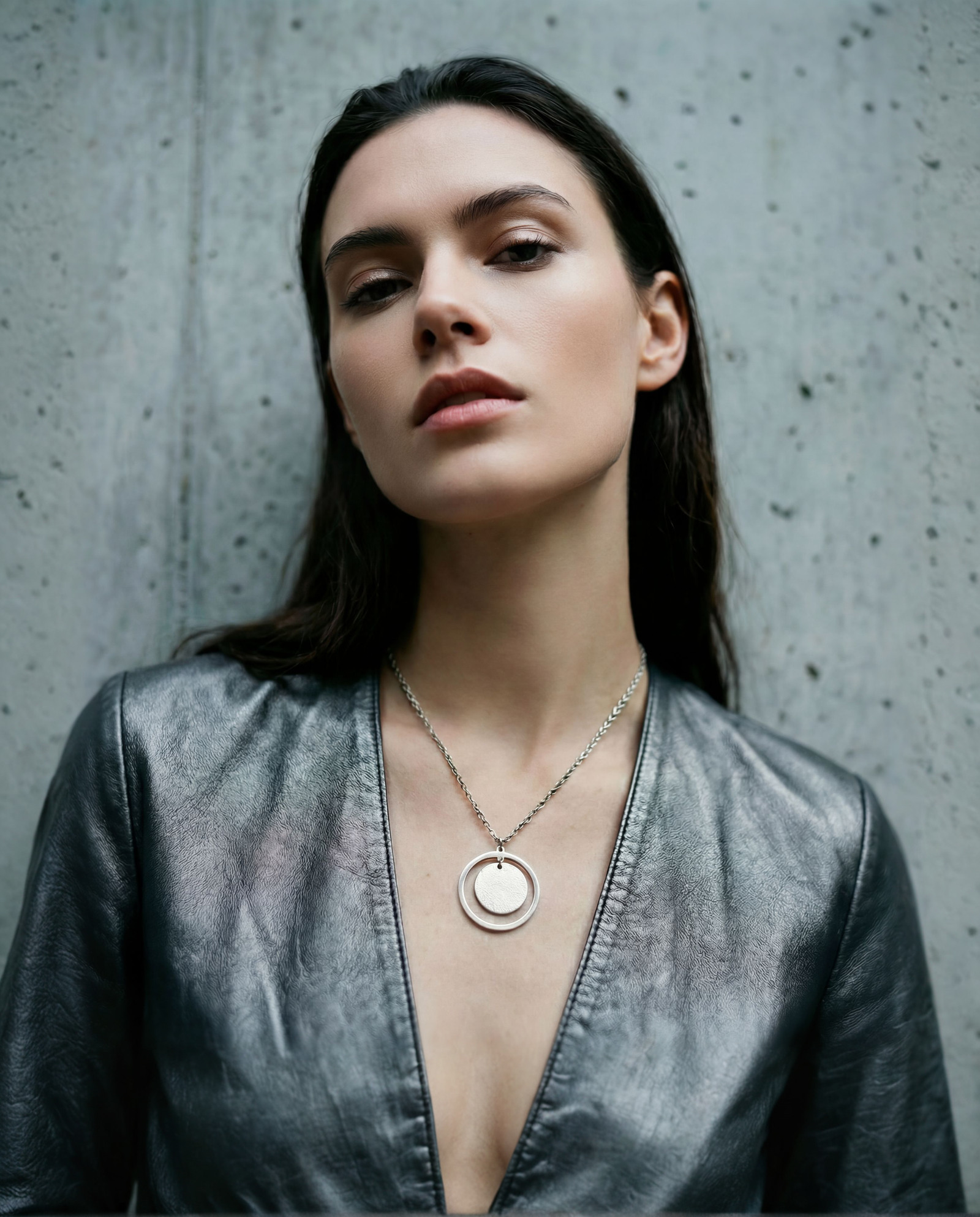 Cassini Halo necklace in high-polish silver stainless steel featuring a 30mm circular ring pendant with a minimalist celestial design