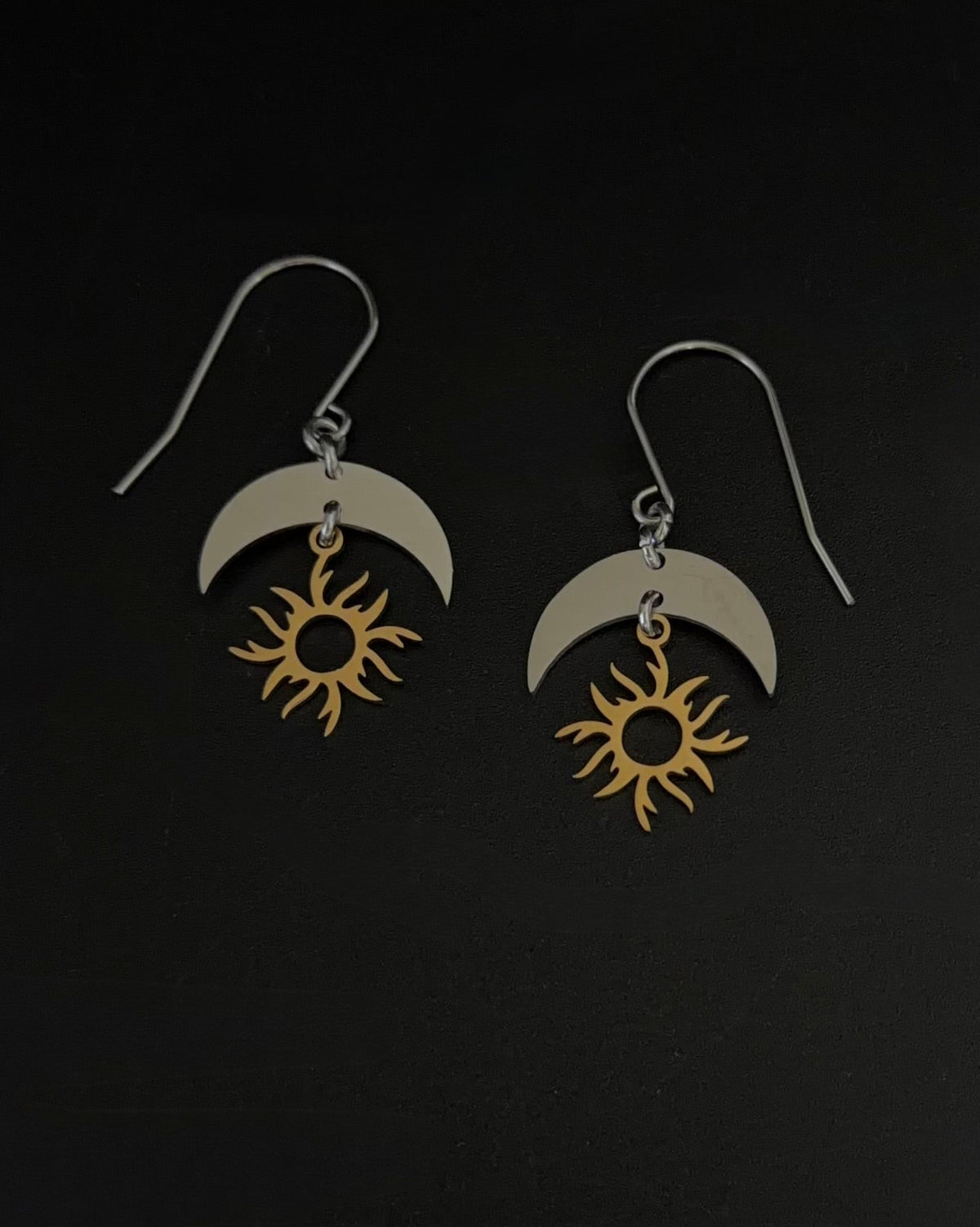 Gold plated and silver stainless steel drop earrings featuring sun and moon charms, 40mm length, Lawless Jewellery.