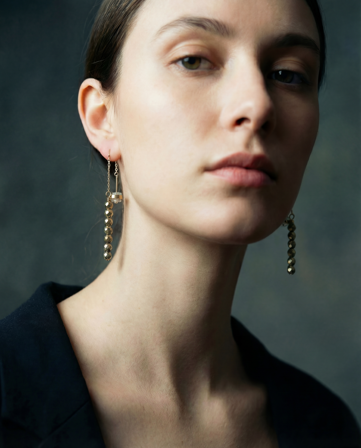 Gold ear threader earrings with fire-polished crystal drops and adjustable length, Eos Collection by Lawless Jewellery.