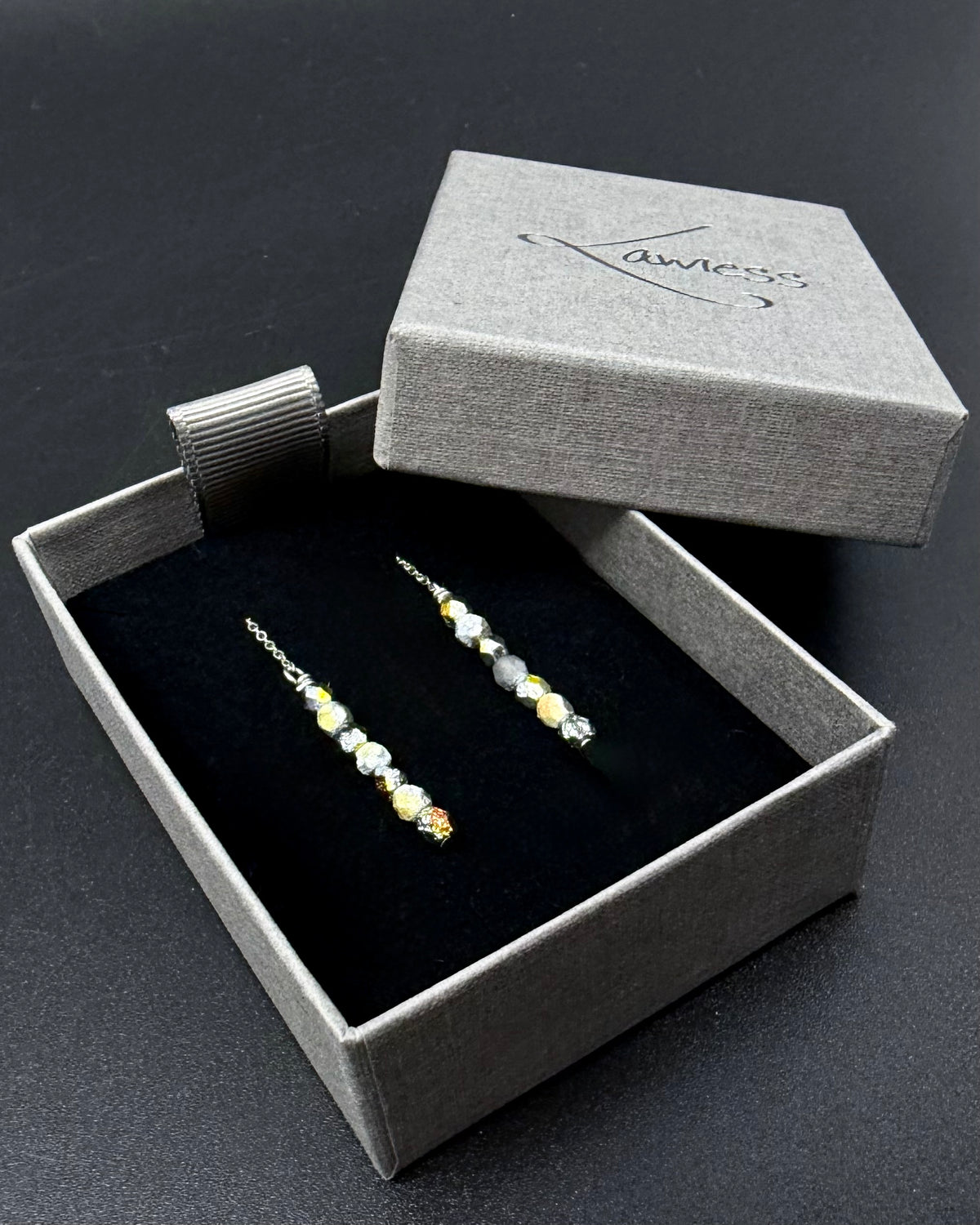 Silver Eos ear thread earrings with mixed silver and gold fire-polished bead drops, minimalist celestial threader design
