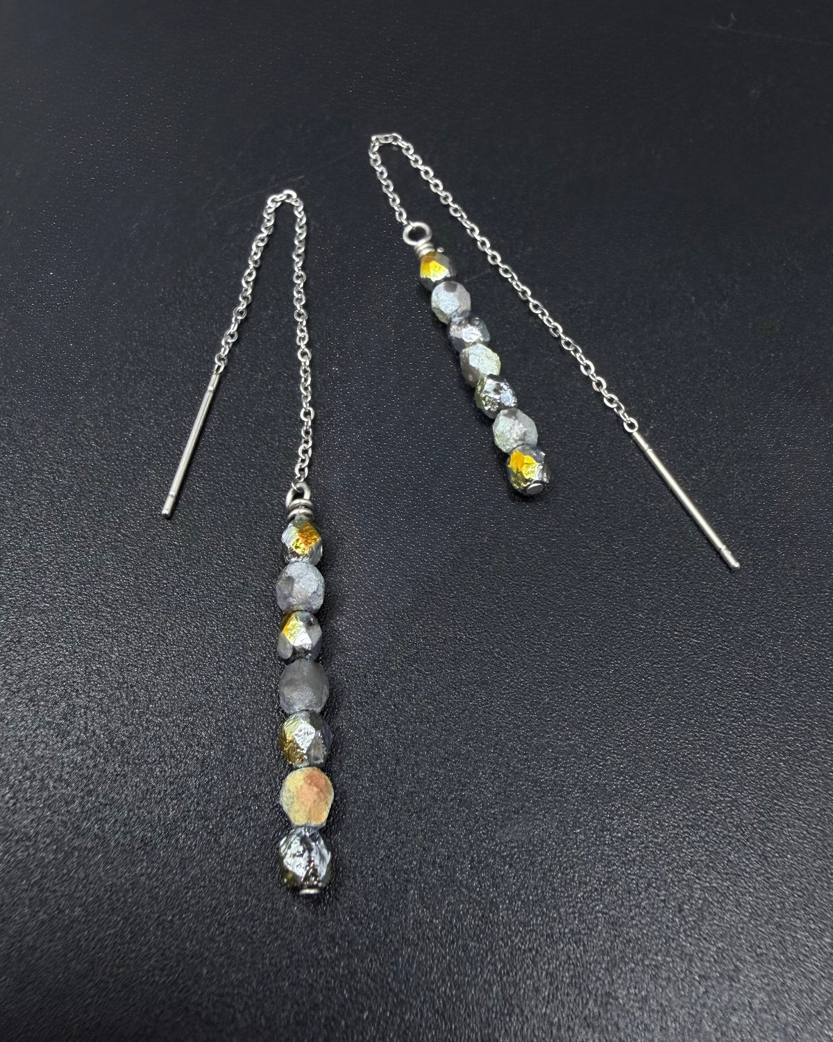Silver Eos ear thread earrings with mixed silver and gold fire-polished bead drops, minimalist celestial threader design
