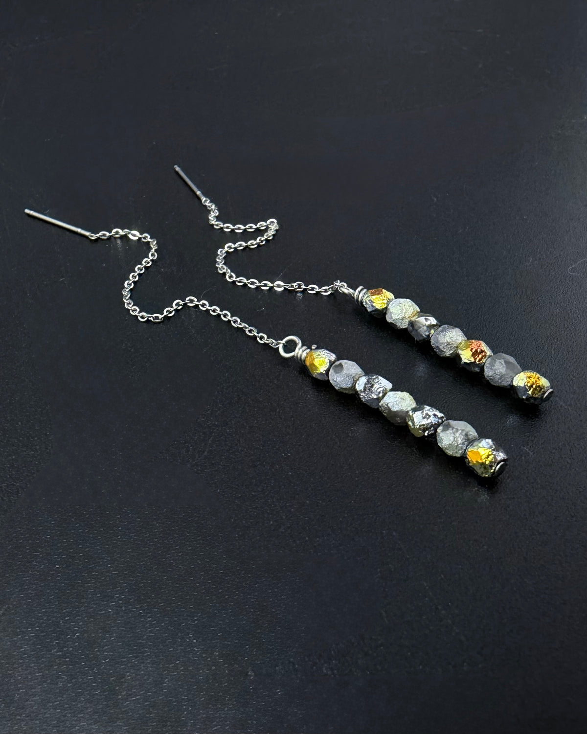 Silver Eos ear thread earrings with mixed silver and gold fire-polished bead drops, minimalist celestial threader design