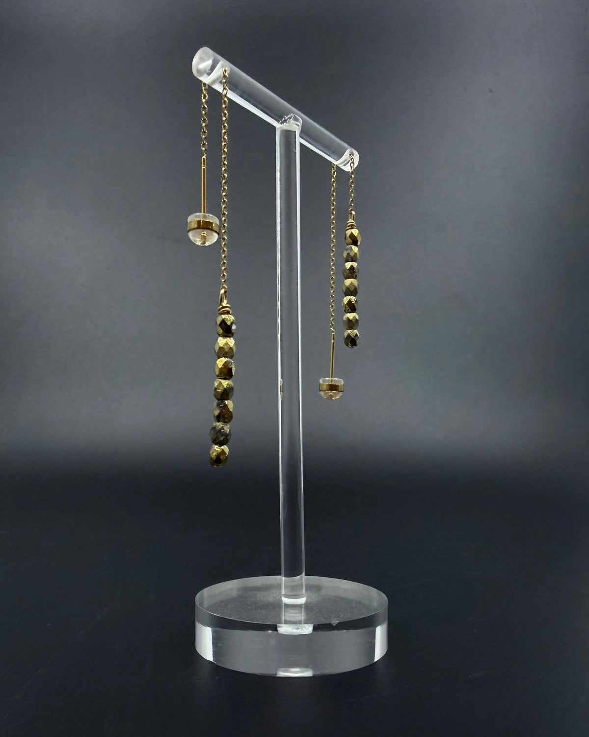 Gold ear threader earrings with fire-polished crystal drops and adjustable length, Eos Collection by Lawless Jewellery.