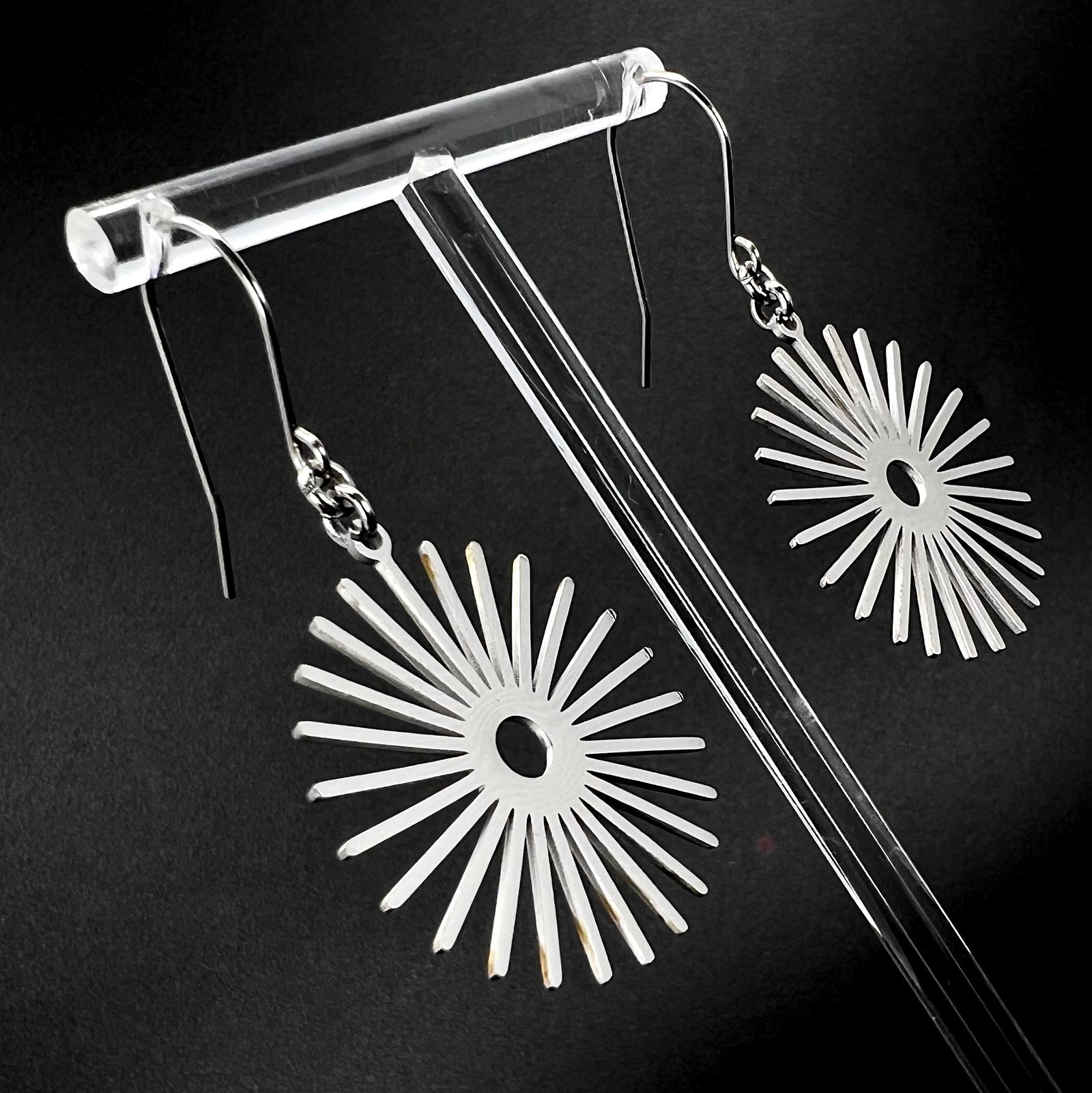 Silver stainless steel sunburst earrings with high-polish finish, 3 cm wide with a 5 cm drop — Ignia Earrings from the Eos Collection, Lawless Jewellery.
