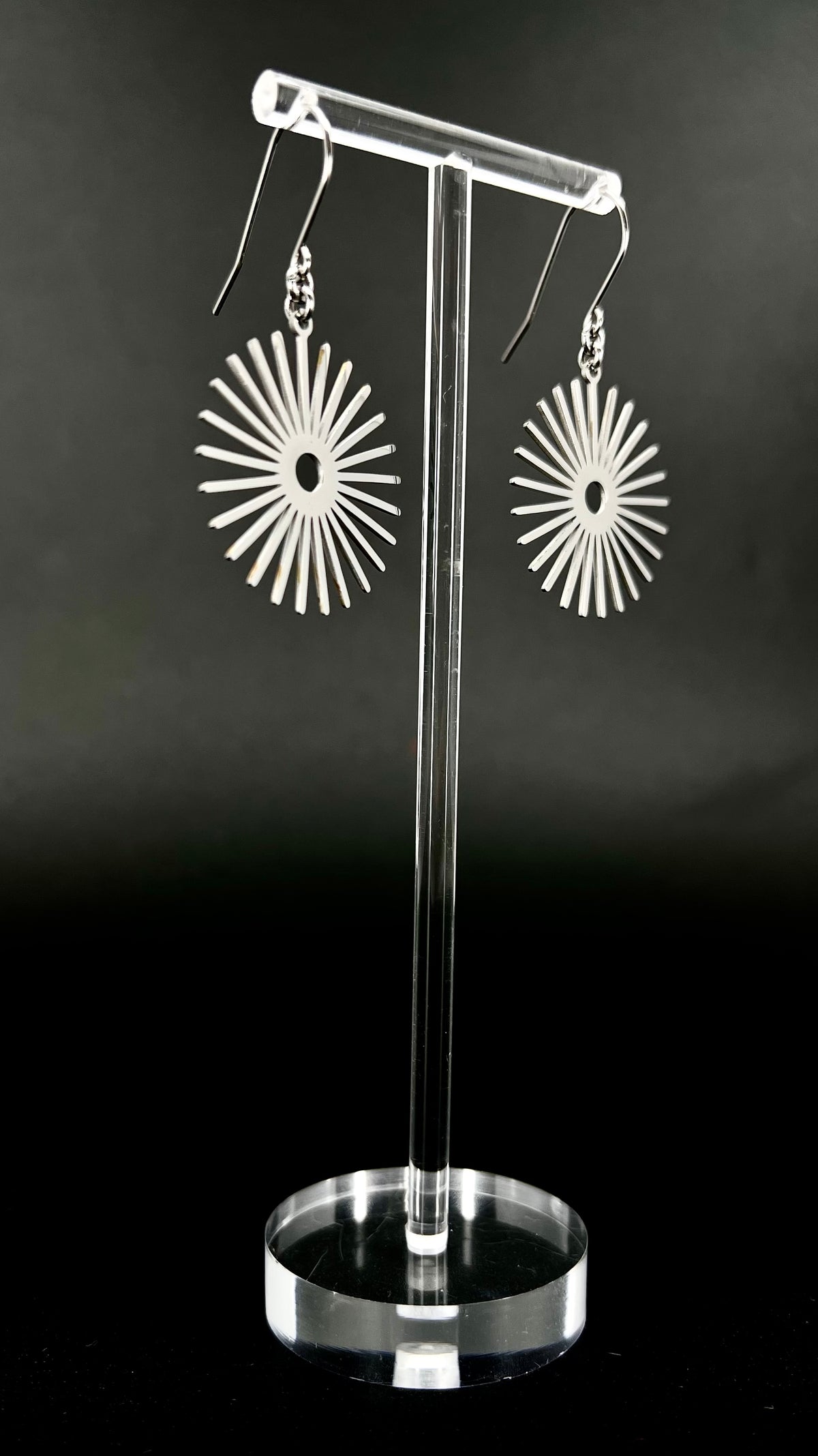 Silver stainless steel sunburst earrings with high-polish finish, 3 cm wide with a 5 cm drop — Ignia Earrings from the Eos Collection, Lawless Jewellery.