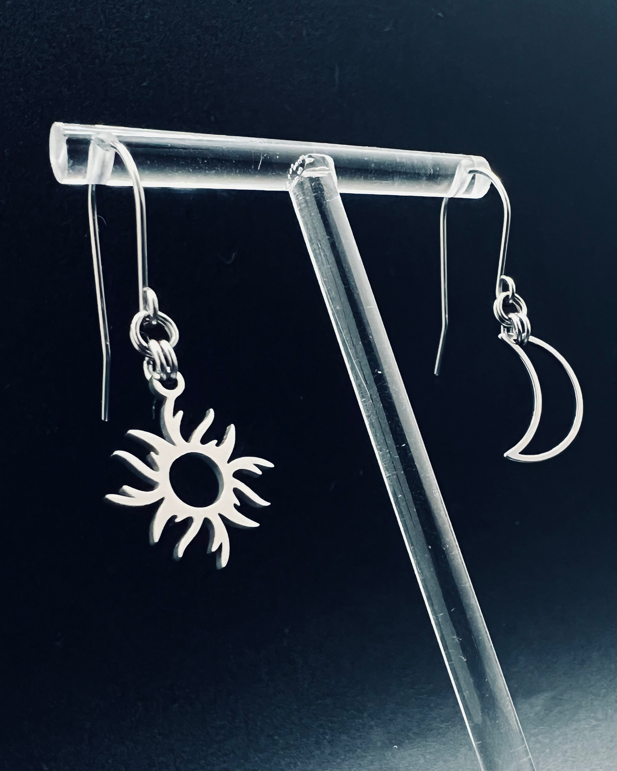 Mismatched stainless steel earrings featuring a crescent moon and radiant sun motif with a 3.5 cm drop - Eos Threshold Earrings, Lawless Jewellery