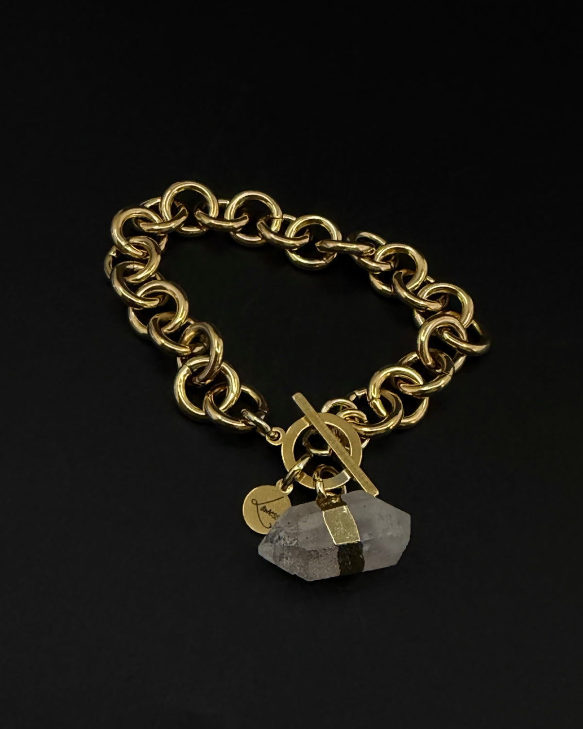 Gold-plated stainless steel chain bracelet with raw clear quartz crystal detail and toggle clasp, Athena Axiom Bracelet by Lawless Jewellery.