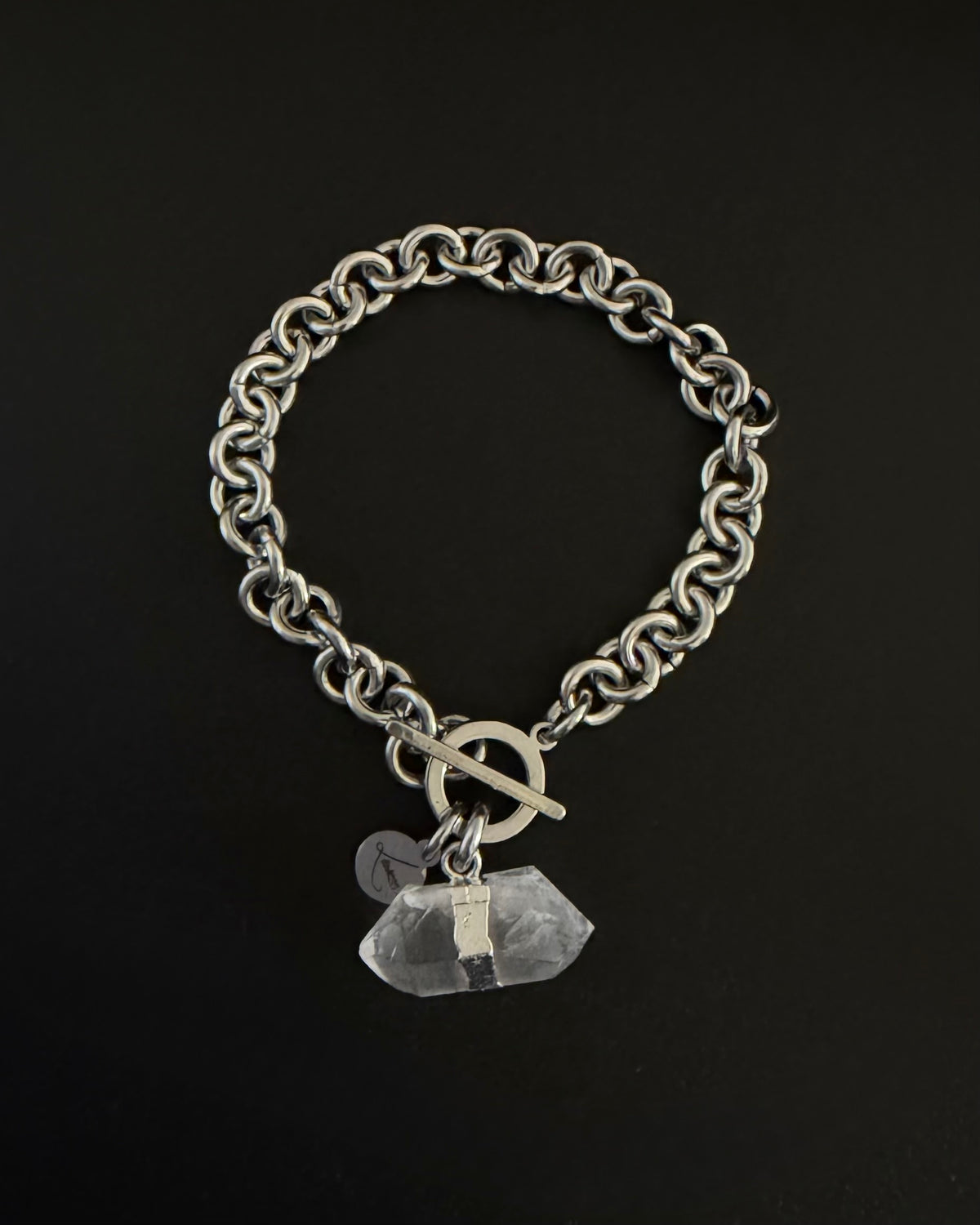 Silver stainless steel chain bracelet with raw clear quartz crystal detail on an 8 mm chain and toggle clasp, Athena Axiom Bracelet by Lawless Jewellery.
