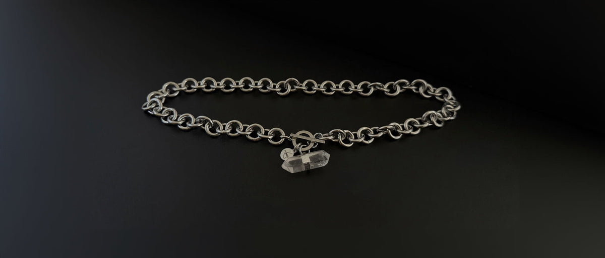 Stainless steel 12mm link chain necklace with raw quartz crystal pendant and toggle clasp, 47cm length — Athena Axiom Necklace, Lawless Jewellery.