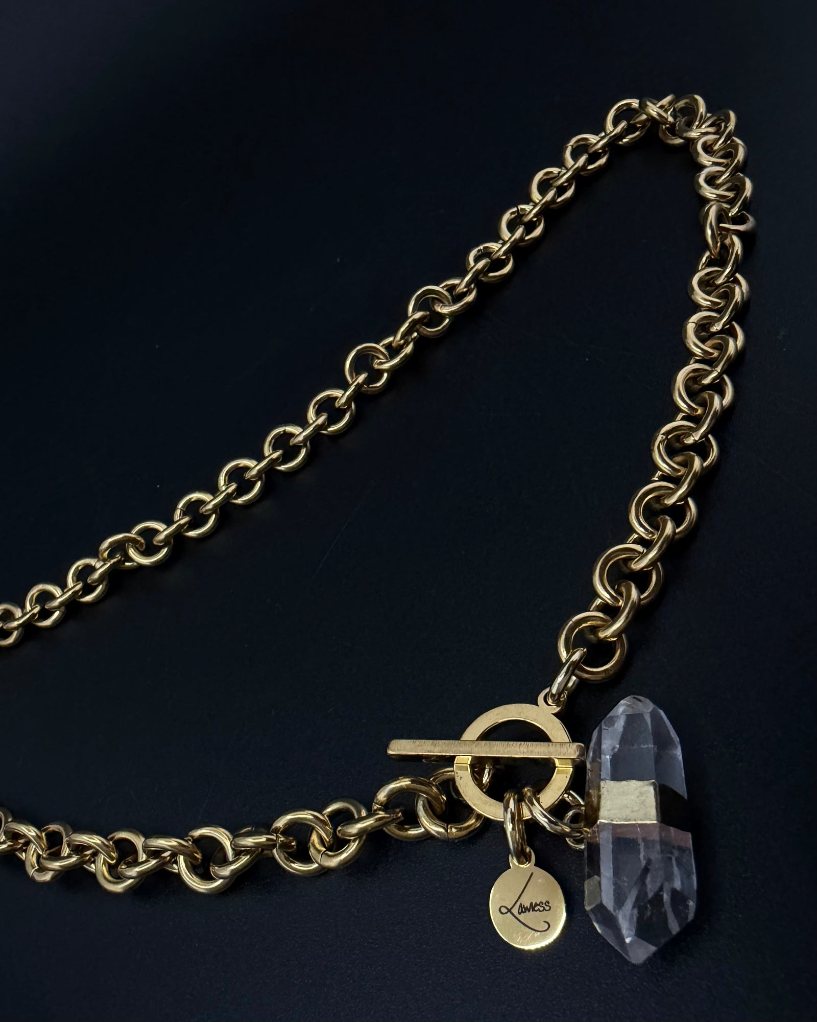 Gold-plated stainless steel chain necklace with raw clear quartz crystal pendant on an 8 mm chain, Athena Axiom Necklace by Lawless Jewellery.