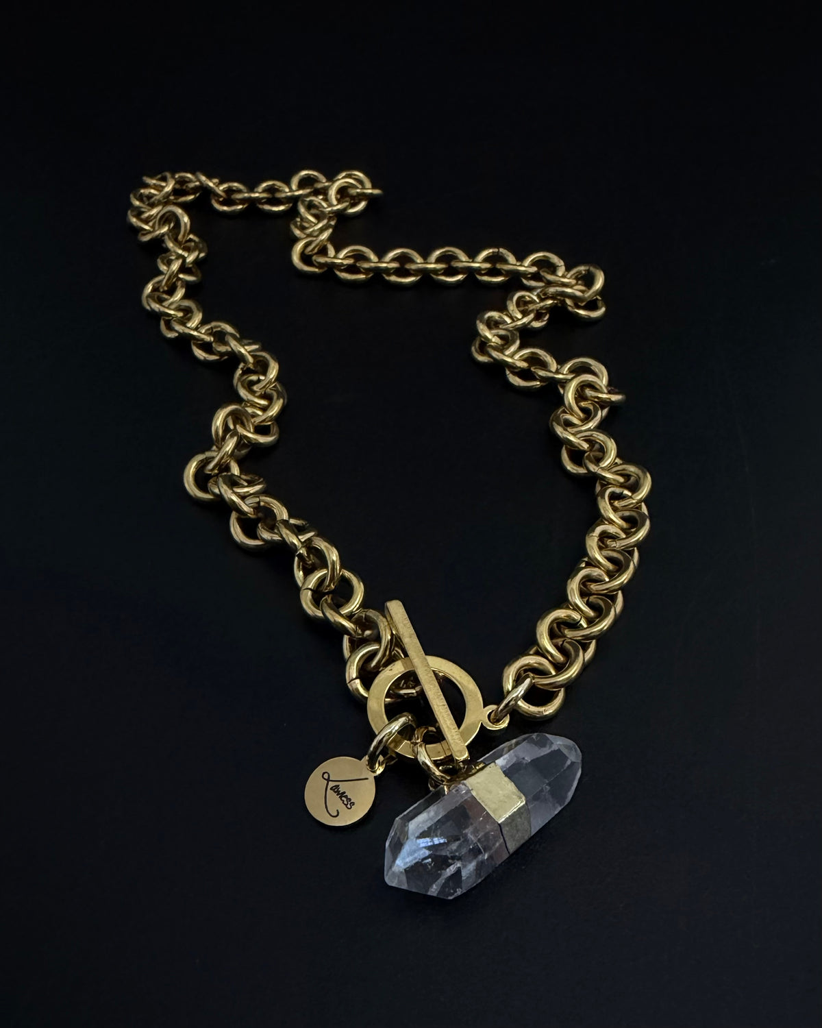 Gold-plated stainless steel chain necklace with raw clear quartz crystal pendant on an 8 mm chain, Athena Axiom Necklace by Lawless Jewellery.