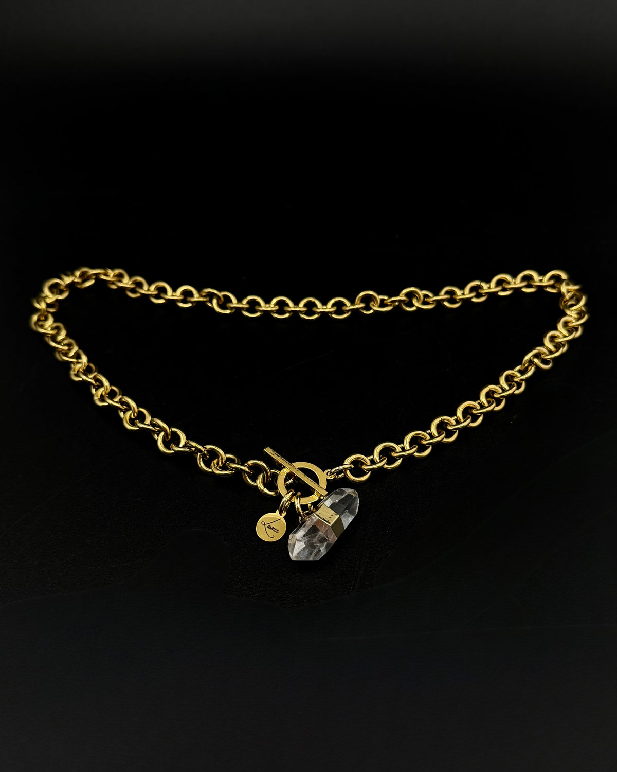 Gold-plated stainless steel chain necklace with raw clear quartz crystal pendant on an 8 mm chain, Athena Axiom Necklace by Lawless Jewellery.