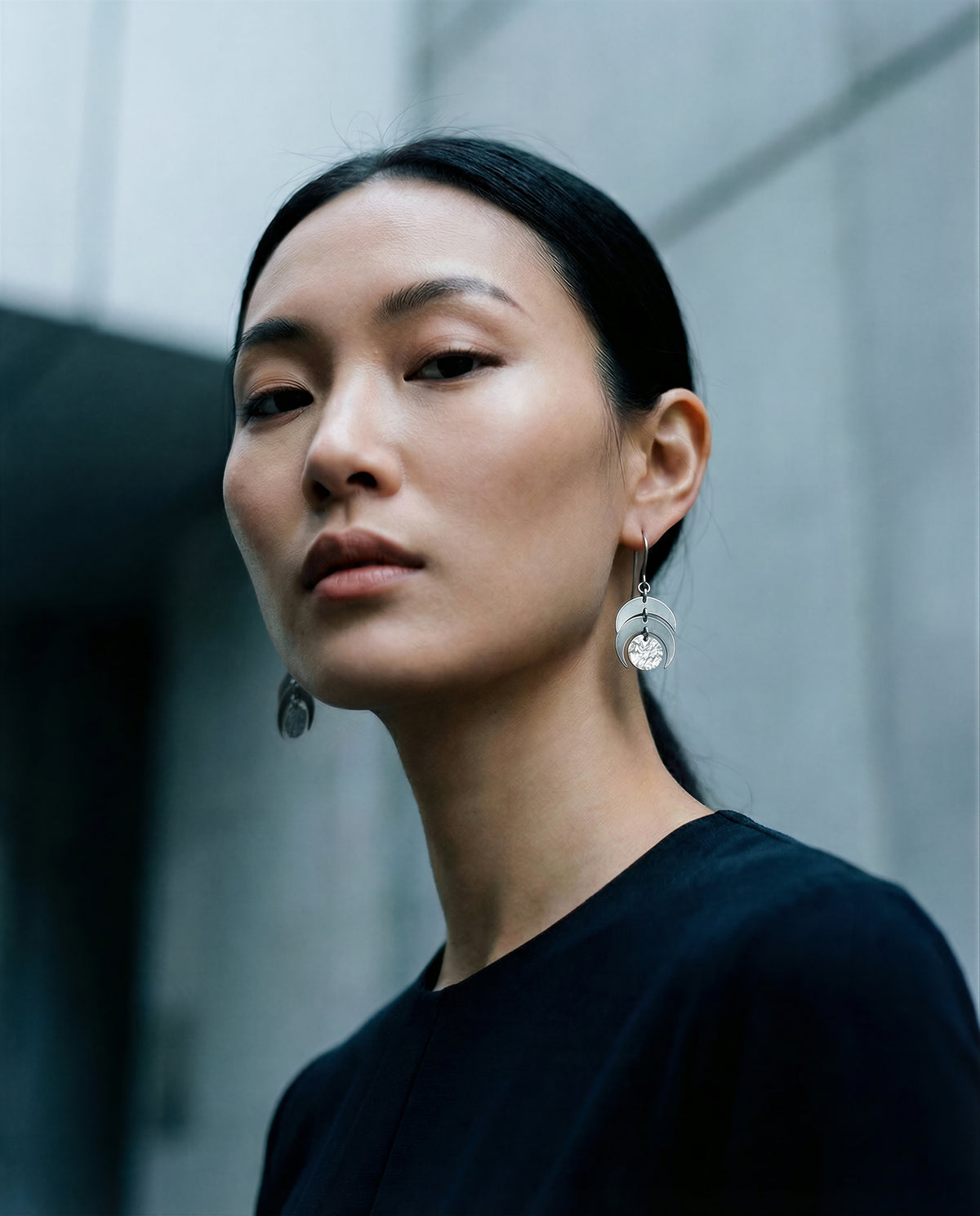 Silver Luna Phase Earrings with polished stainless-steel crescents and textured central disc, 20 mm wide and 4 cm long — Lawless Jewellery