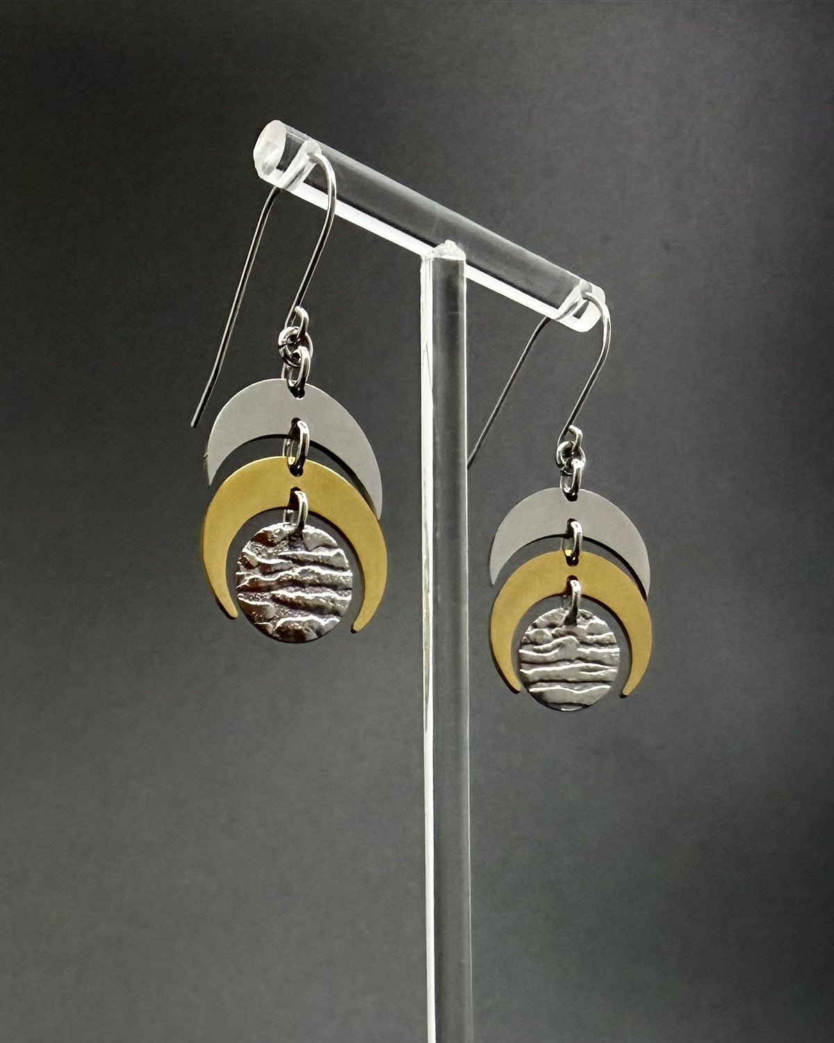 Silver and gold Luna Phase earrings with crescent moon design and textured gold lunar disc, lightweight stainless steel