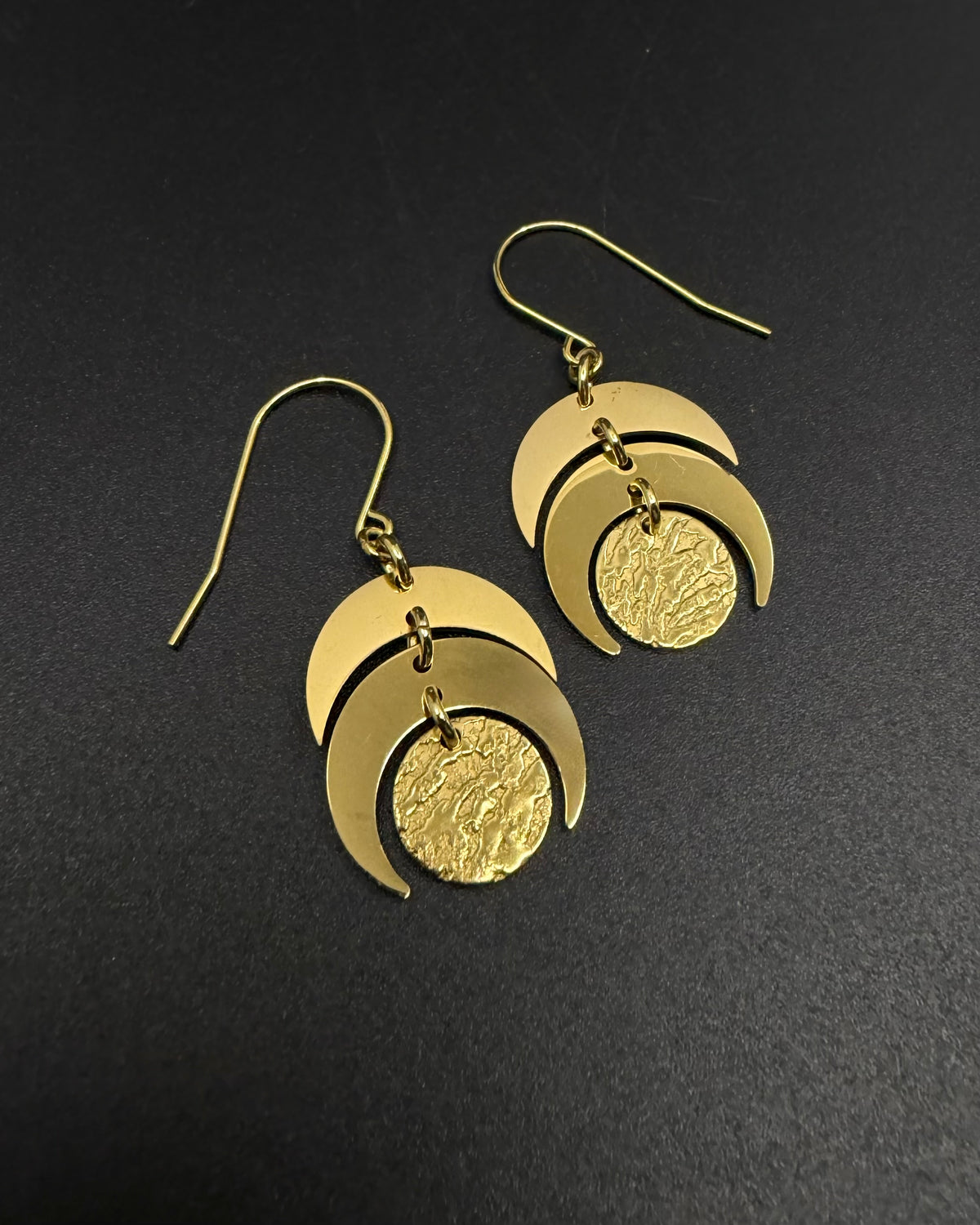 Gold Luna Phase Earrings with sculptural crescent design and textured disc, 20 mm wide with 40 mm drop — Lawless Jewellery.