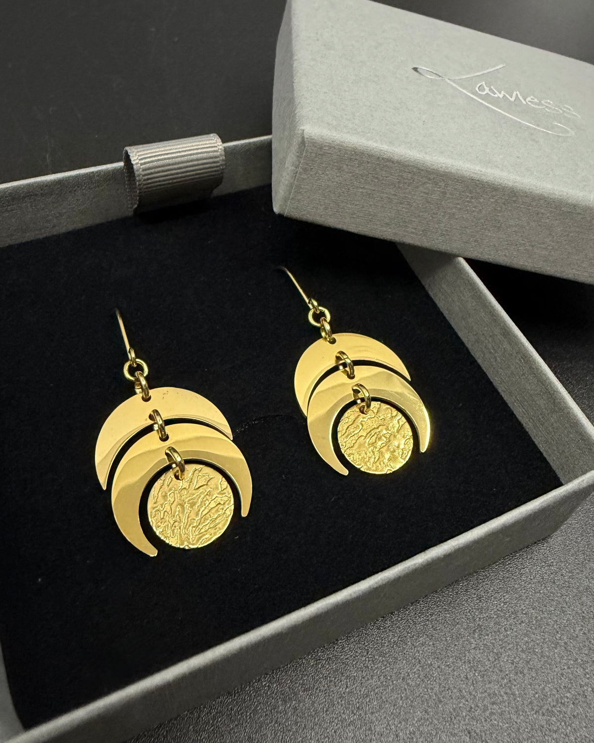 Gold Luna Phase Earrings with sculptural crescent design and textured disc, 20 mm wide with 40 mm drop — Lawless Jewellery.