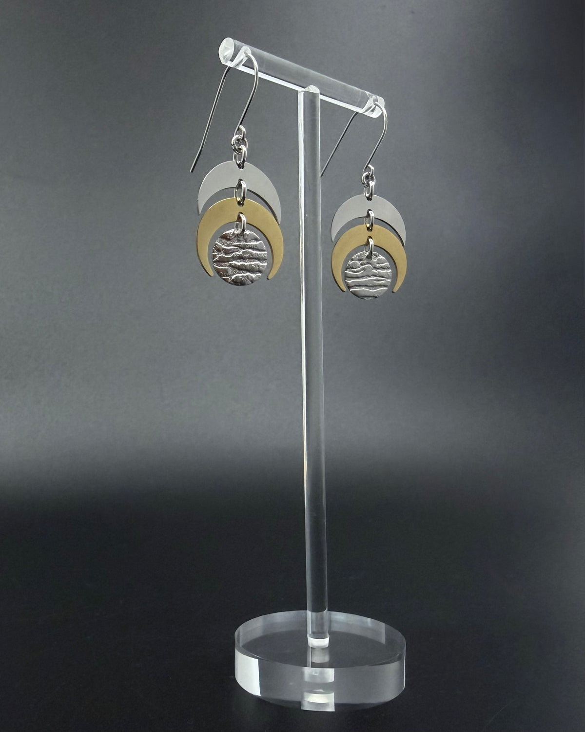 Silver and gold Luna Phase earrings with crescent moon design and textured gold lunar disc, lightweight stainless steel