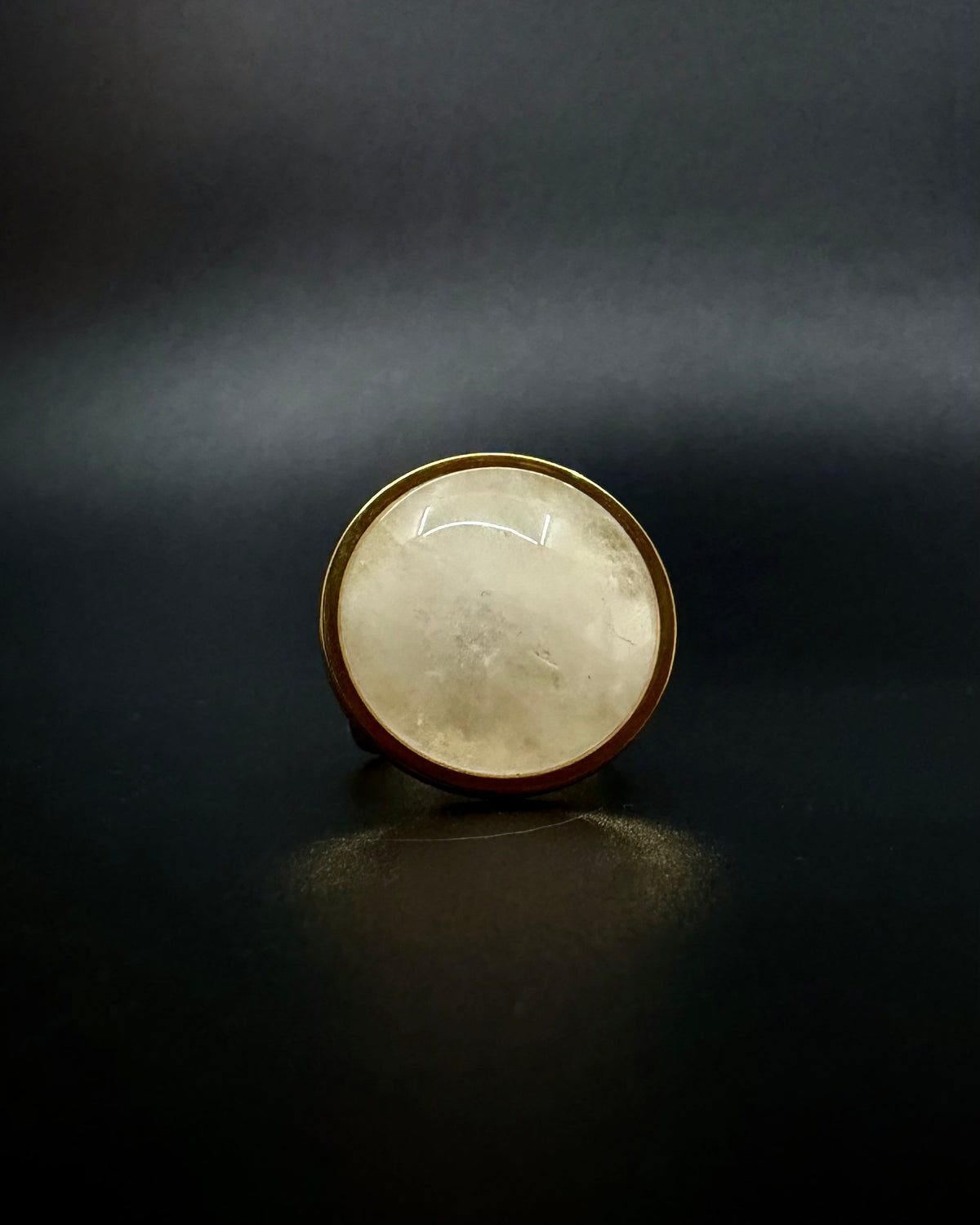 Gold adjustable statement ring with 20mm domed quartz crystal gemstone, double-shank stainless steel band, Nebulae Core Ring by Lawless Jewellery