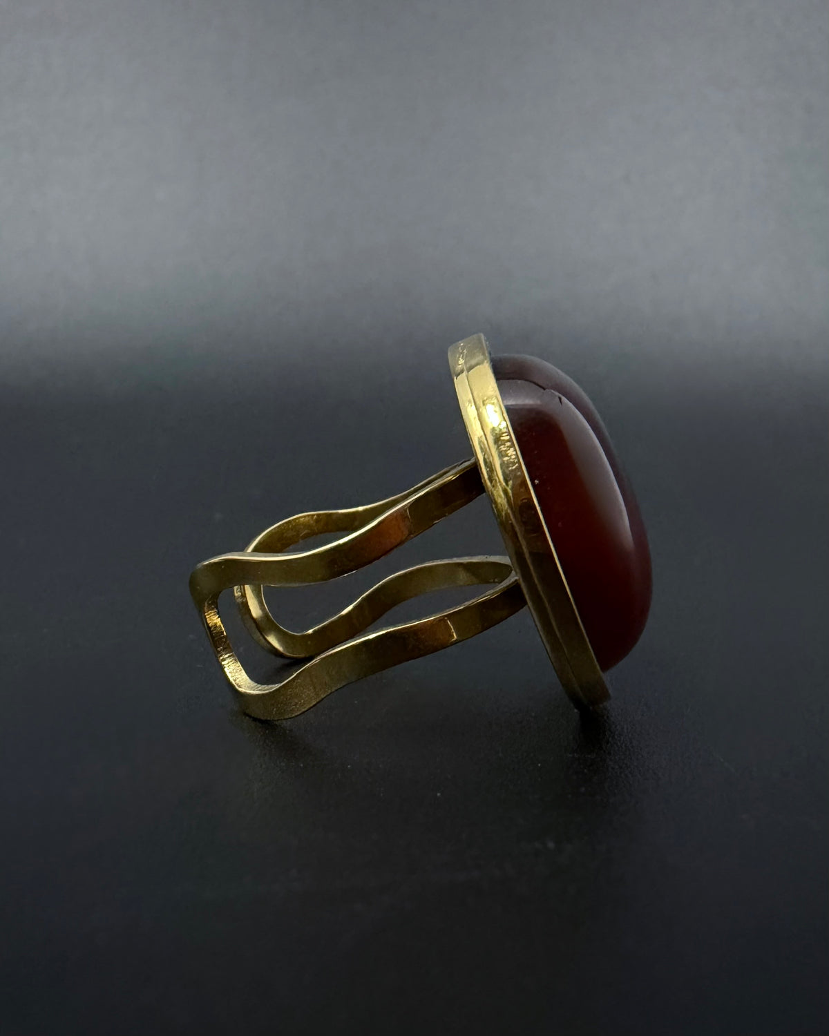 Gold adjustable statement ring with 20mm domed carnelian gemstone, double-shank stainless steel band, Nebulae Core Ring by Lawless Jewellery