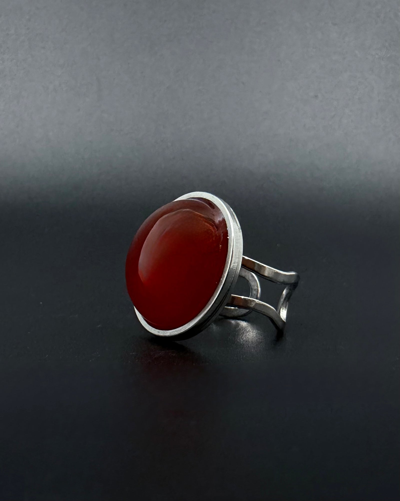 Silver adjustable statement ring with 20mm domed carnelian gemstone, double-shank stainless steel band, Nebulae Core Ring by Lawless Jewellery