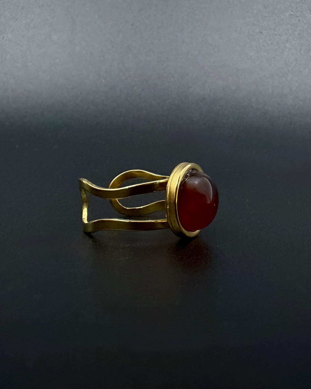 Gold adjustable statement ring with 10mm domed carnelian gemstone, double-shank stainless steel band, Nebulae Core Ring by Lawless Jewellery