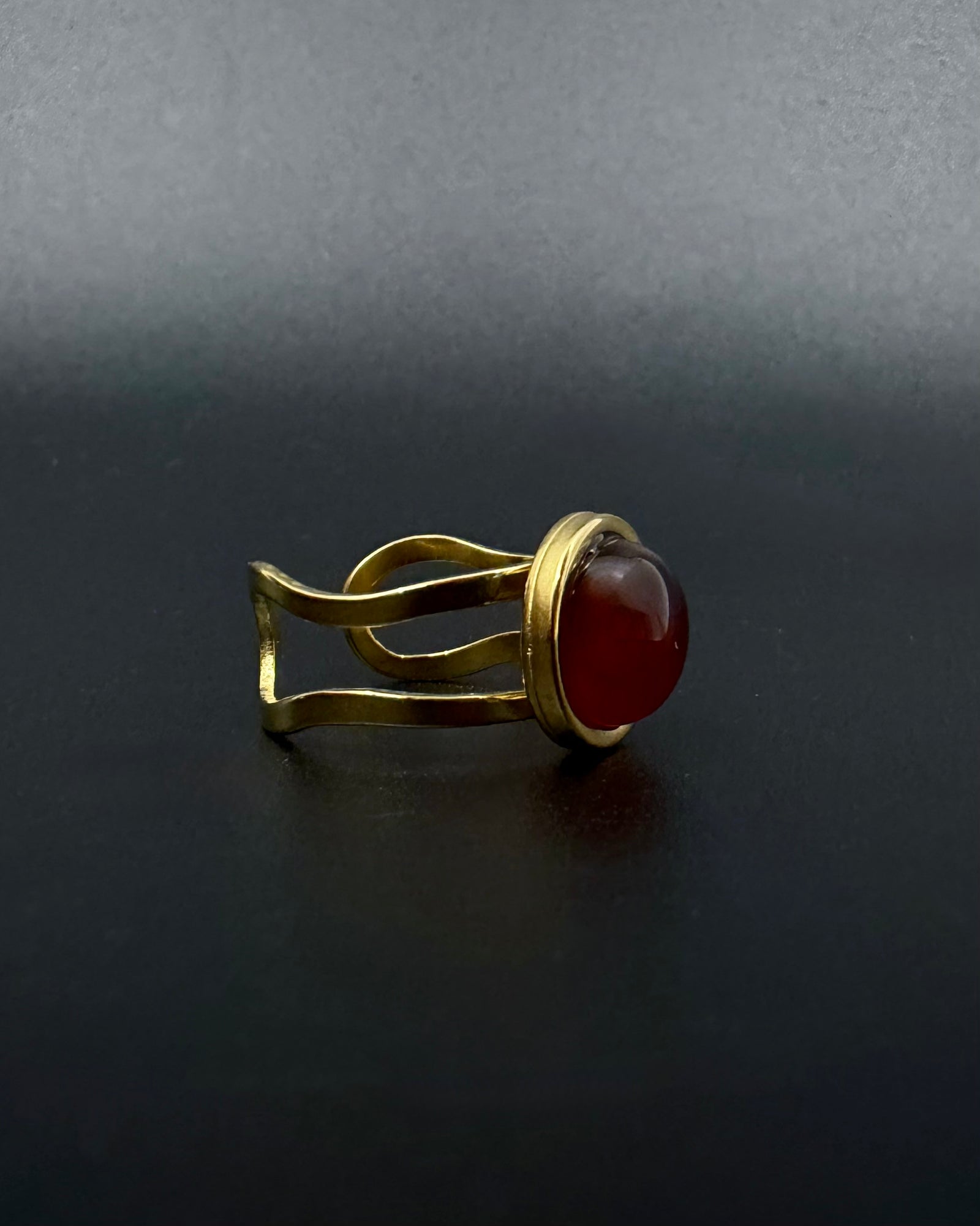 Gold adjustable statement ring with 10mm domed carnelian gemstone, double-shank stainless steel band, Nebulae Core Ring by Lawless Jewellery