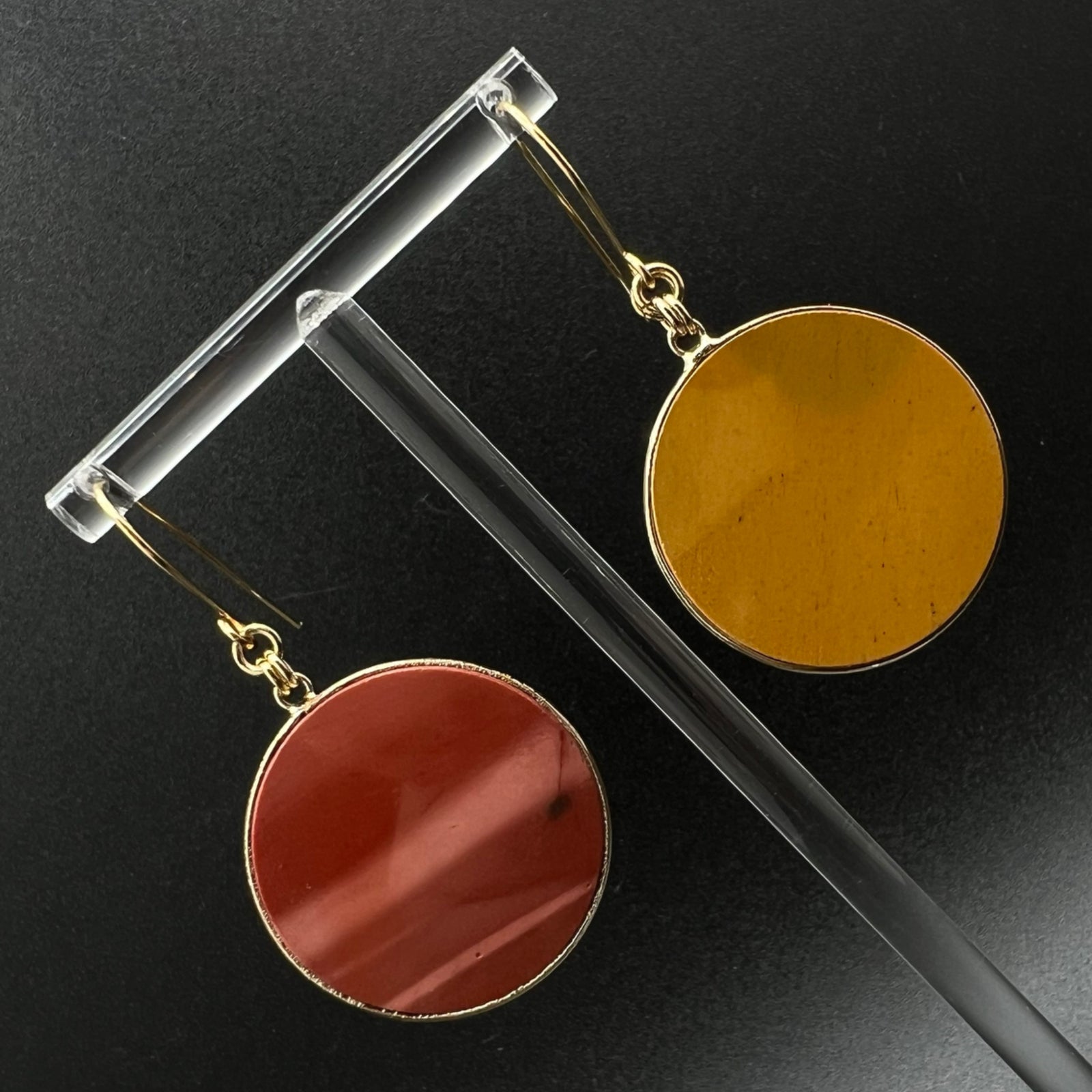 Gold-framed natural Mookaite stone earrings in red and yellow tones with gold-plated stainless steel ear fittings, 5.5 cm length — Lawless Jewellery.