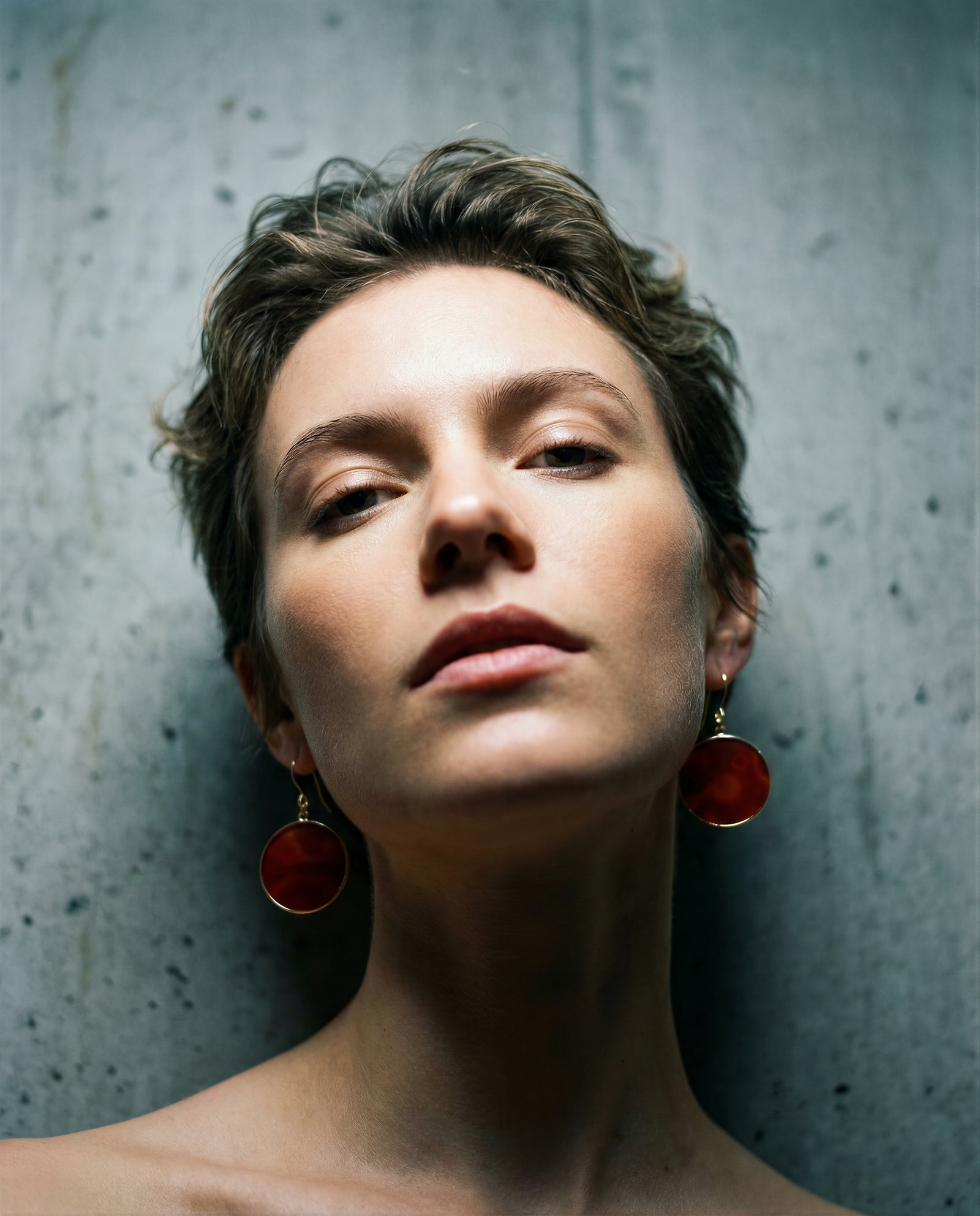 Nebulae Trace Earrings in Carnelian featuring 30mm burnt orange gemstone discs with gold stainless steel hooks, celestial statement drop earrings by Lawless Jewellery