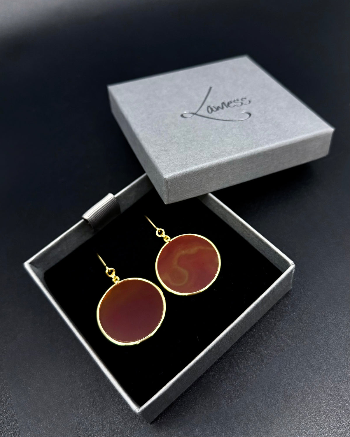 Nebulae Trace Earrings in Carnelian featuring 30mm burnt orange gemstone discs with gold stainless steel hooks, celestial statement drop earrings by Lawless Jewellery