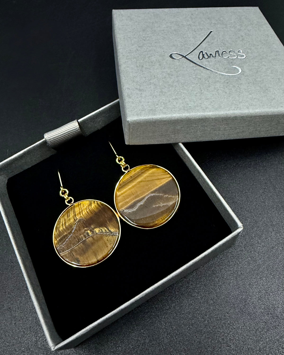 Nebulae Trace Earrings in Tiger Eye with 30mm brown and gold banded gemstone discs and gold stainless steel hooks, celestial drop earrings by Lawless Jewellery