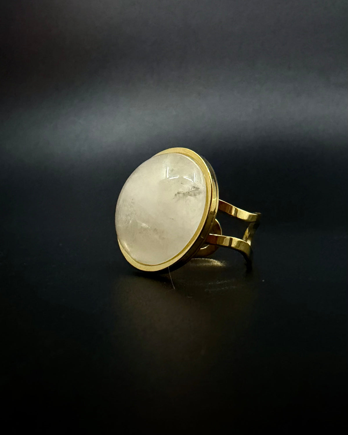 Gold adjustable statement ring with 20mm domed quartz crystal gemstone, double-shank stainless steel band, Nebulae Core Ring by Lawless Jewellery