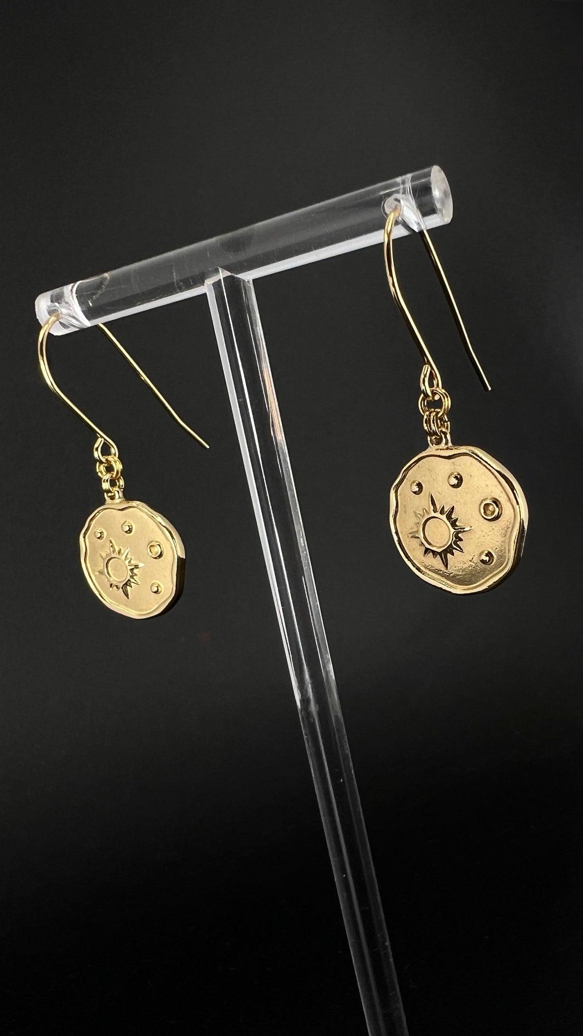 Gold-plated stainless steel earrings with engraved star-motif discs, 1.5 cm wide with a 4 cm drop — Azimuth Earrings, Lawless Jewellery.