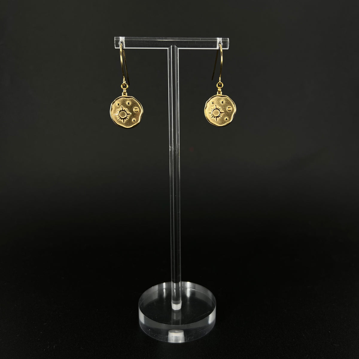 Gold-plated stainless steel earrings with engraved star-motif discs, 1.5 cm wide with a 4 cm drop — Azimuth Earrings, Lawless Jewellery.
