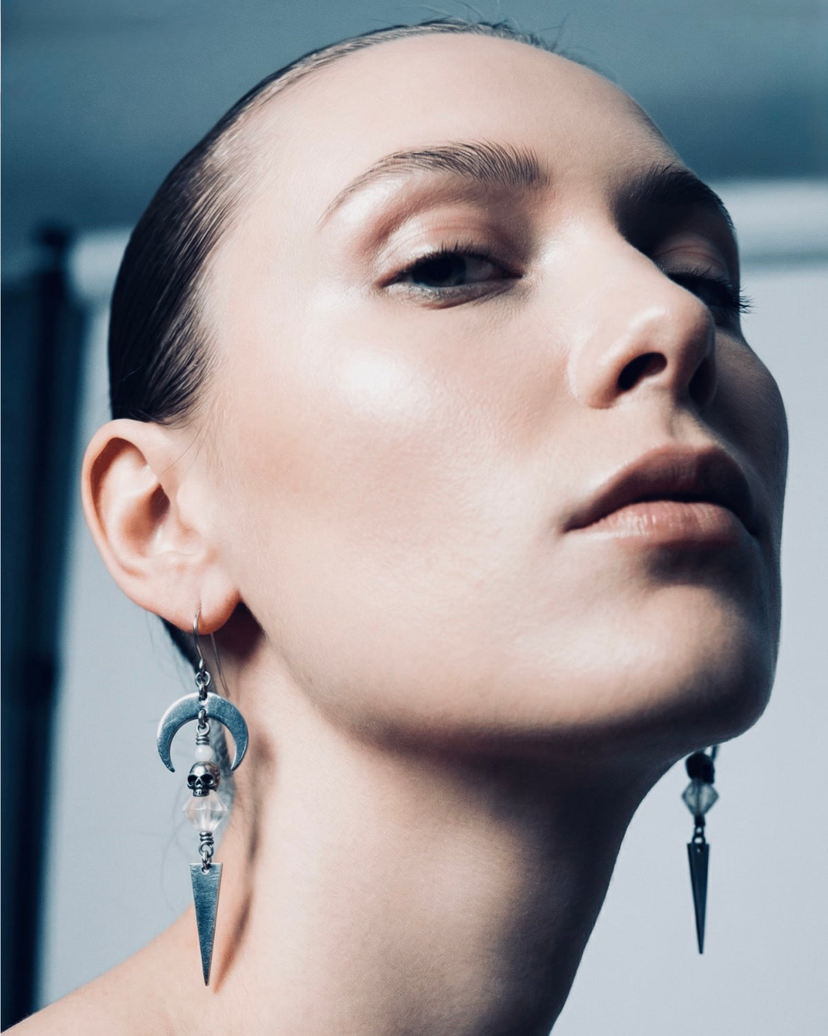Silver stainless steel earrings featuring Moonstone, Quartz Crystal, and small skull details — limited edition design from The Shadow Edit — Lawless Jewellery