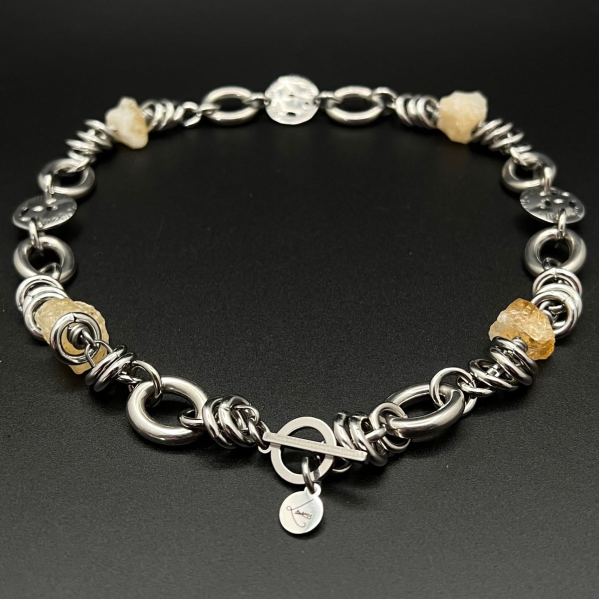 Stainless steel link-chain necklace with raw golden Citrine nuggets (approx. 15 × 10 mm each) and toggle clasp, 48 cm length — Lawless Jewellery.