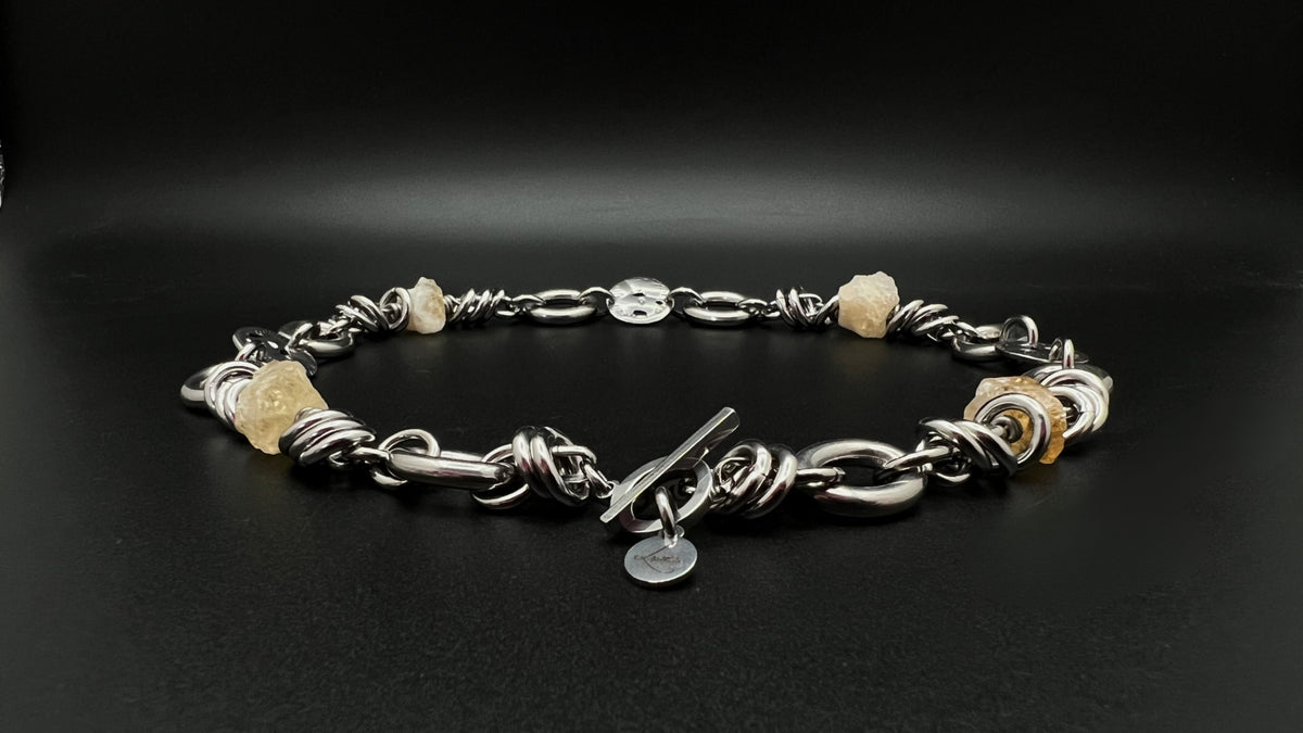 Stainless steel link-chain necklace with raw golden Citrine nuggets (approx. 15 × 10 mm each) and toggle clasp, 48 cm length — Lawless Jewellery.