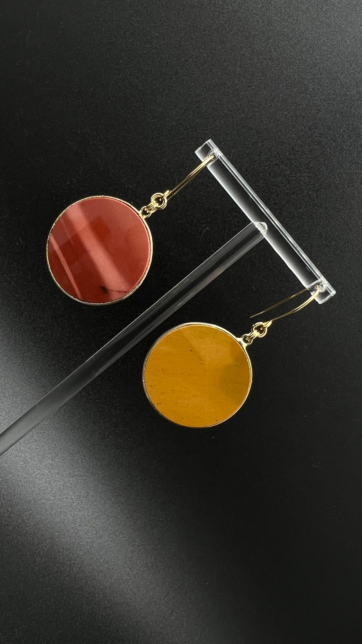 Gold-framed natural Mookaite stone earrings in red and yellow tones with gold-plated stainless steel ear fittings, 5.5 cm length — Lawless Jewellery.