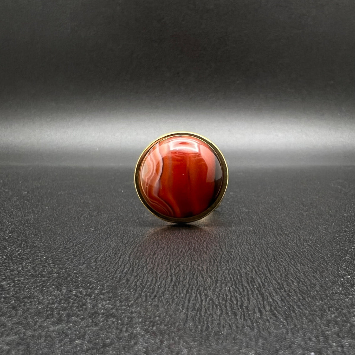 Set of three gold-plated stainless steel rings featuring 20 mm cabochons in Clear Quartz, Gold Druzy, and Carnelian on adjustable double-shank bands — Lawless Jewellery.