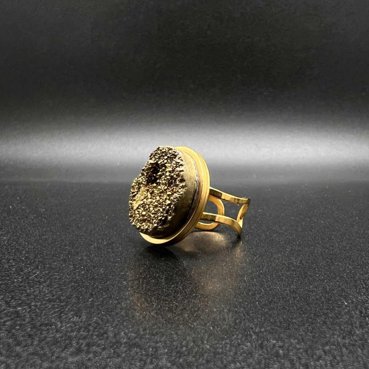 Set of three gold-plated stainless steel rings featuring 20 mm cabochons in Clear Quartz, Gold Druzy, and Carnelian on adjustable double-shank bands — Lawless Jewellery.