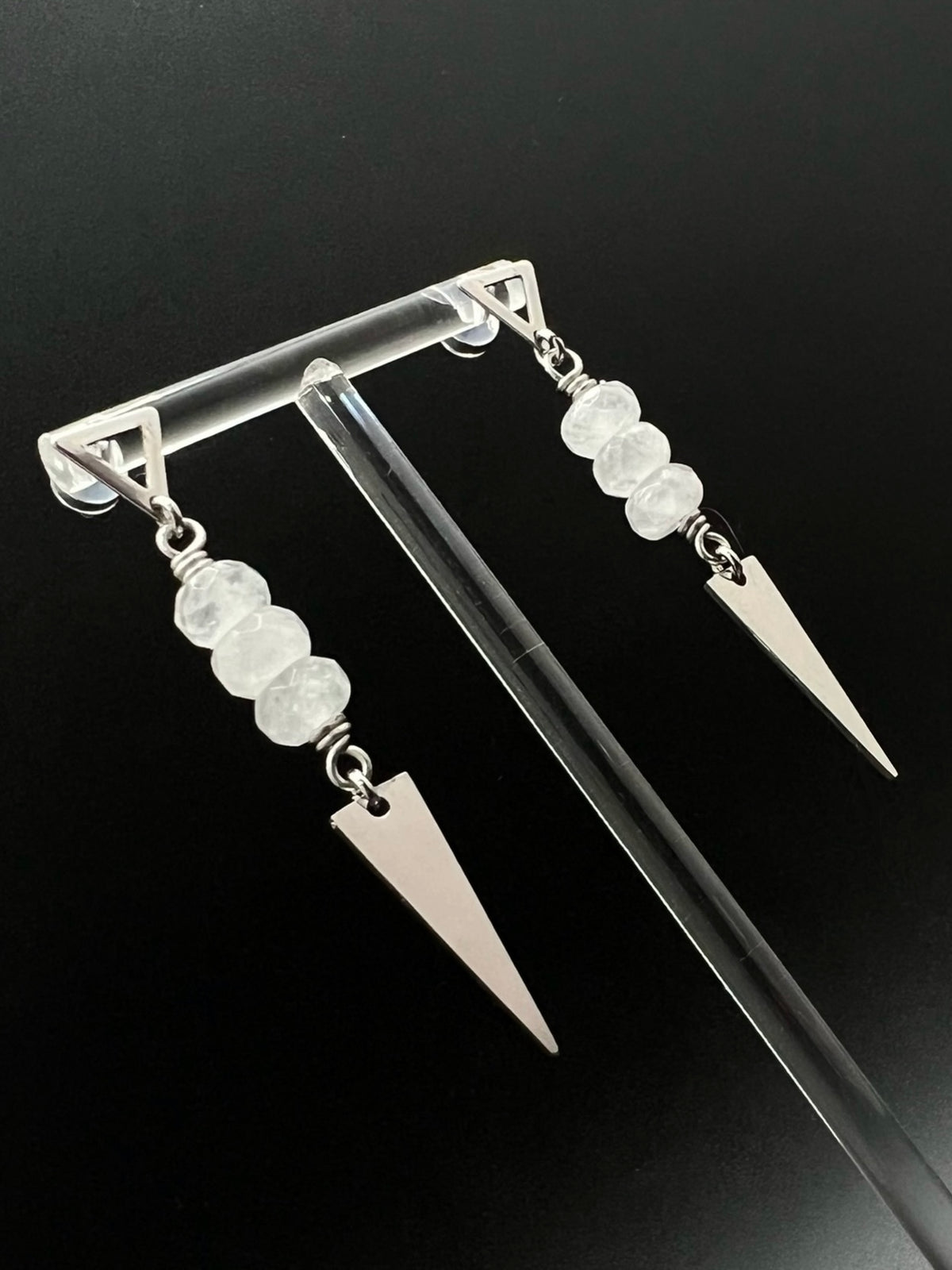 Stainless steel spear-drop earrings with triangle studs and three faceted clear quartz beads, 6.5 cm length, inspired by Orion’s celestial geometry — Lawless Jewellery.