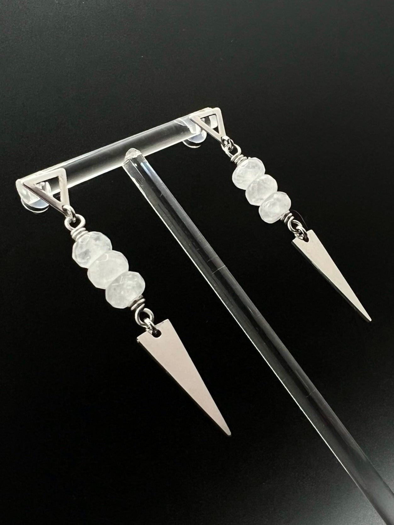 Stainless steel spear-drop earrings with triangle studs and three faceted clear quartz beads, 6.5 cm length, inspired by Orion’s celestial geometry — Lawless Jewellery.