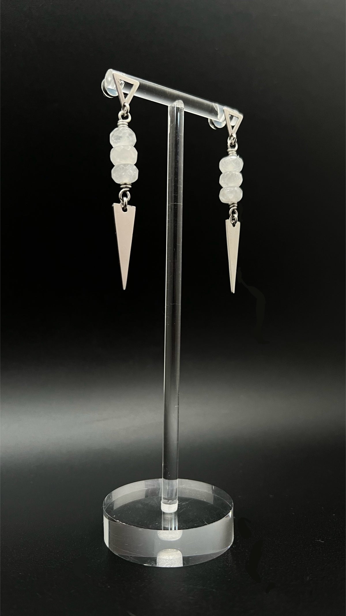 Stainless steel spear-drop earrings with triangle studs and three faceted clear quartz beads, 6.5 cm length, inspired by Orion’s celestial geometry — Lawless Jewellery.
